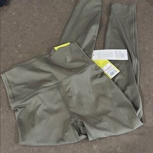 New with tags All in Motion Flex olive green buttery soft leggings. Size small.